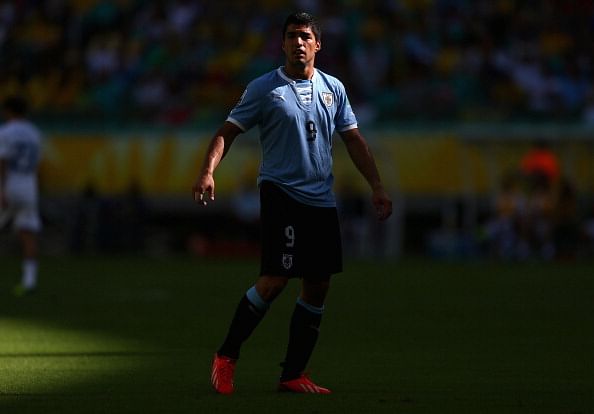 Luis Suarez of Uruguay looks on during the FIFA Confederations Cup Brazil 2013 3rd Place match between Uruguay and Italy at Estadio Octavio Mangabeira (Arena Fonte Nova Salvador) on June 30, 2013 in Salvador, Brazil. (Getty Images)